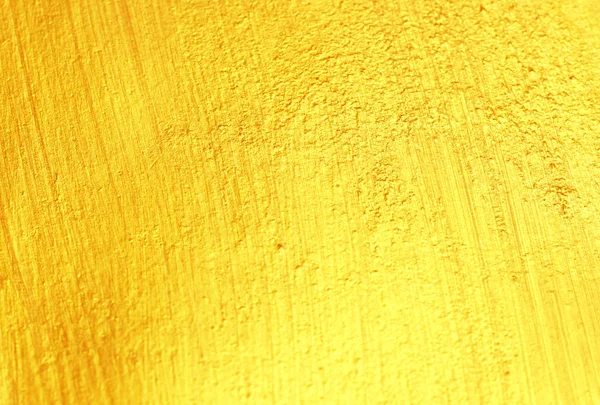 Parlak sarı yaprak altın folyo dokusu arka plan