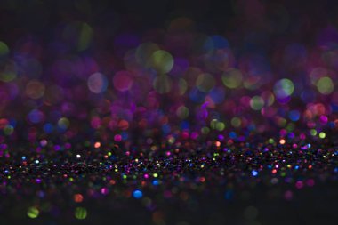 Bokeh glitter sinek ve siyah arka plan ışığı