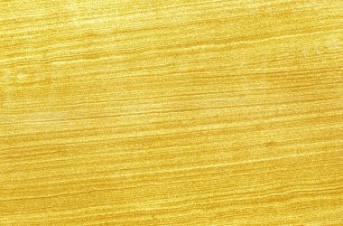 Parlak sarı yaprak altın folyo dokusu arka plan