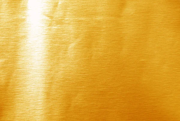 Parlak sarı yaprak altın folyo dokusu arka plan
