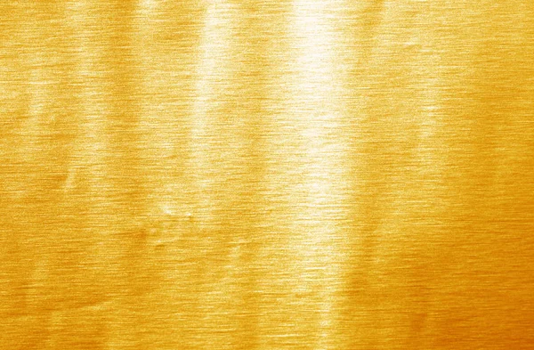 Parlak sarı yaprak altın folyo dokusu arka plan