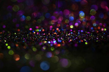 Bokeh glitter sinek ve siyah arka plan ışığı