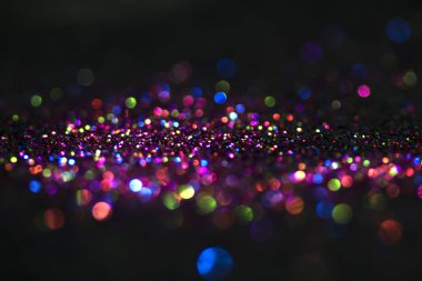 Bokeh glitter sinek ve siyah arka plan ışığı