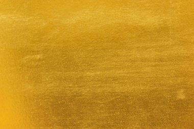 Parlak sarı yaprak altın folyo dokusu arka plan