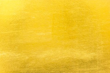 Parlak sarı yaprak altın folyo dokusu arka plan