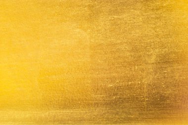 Parlak sarı yaprak altın folyo dokusu arka plan