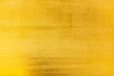 Parlak sarı yaprak altın folyo dokusu arka plan