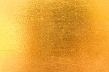 Parlak sarı yaprak altın folyo dokusu arka plan