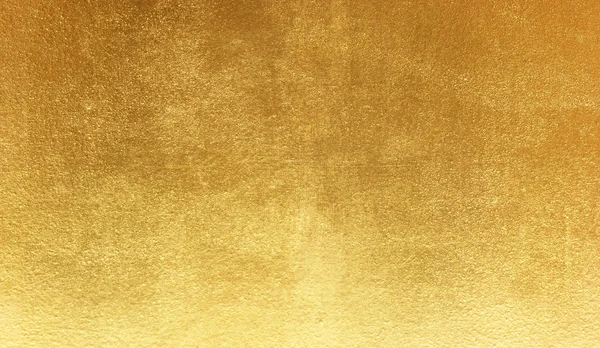 Shiny yellow leaf gold foil texture background