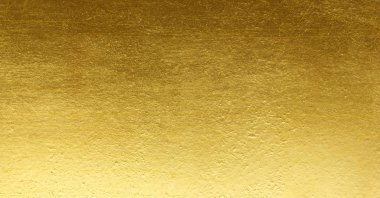 Parlak sarı yaprak altın folyo dokusu arka plan