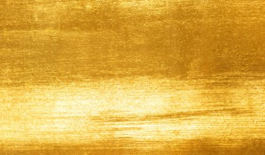 Altın metal fırça arka plan veya doku / altın folyo doku arka plan