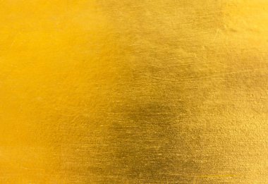 Parlak sarı yaprak altın folyo dokusu arka plan
