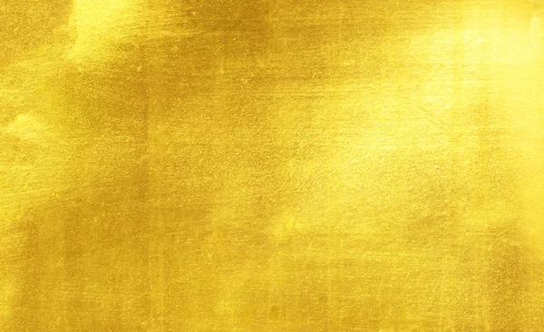 Parlak sarı yaprak altın folyo dokusu arka plan