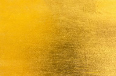 Parlak sarı yaprak altın folyo doku arka plan / arka plan veya doku altın metal fırça