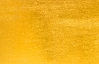 Parlak sarı yaprak altın folyo dokusu arka plan