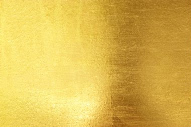 Parlak sarı yaprak altın folyo dokusu arka plan