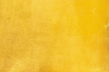 Parlak sarı yaprak altın folyo dokusu arka plan