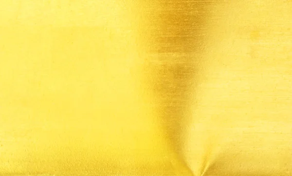 Shiny yellow leaf gold foil texture background