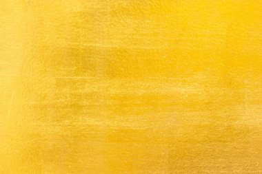 Parlak sarı yaprak altın folyo dokusu arka plan