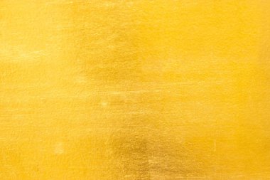 Parlak sarı yaprak altın folyo dokusu arka plan