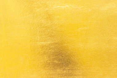 Parlak sarı yaprak altın folyo dokusu arka plan