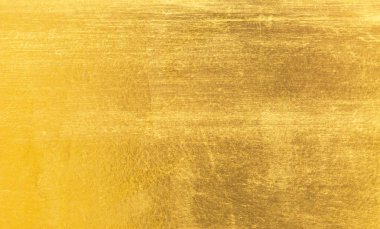 Parlak sarı yaprak altın folyo dokusu arka plan