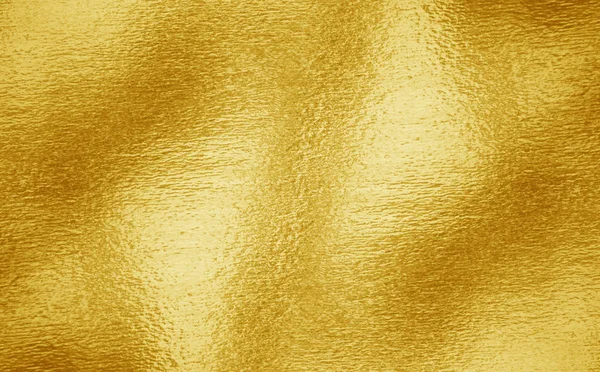 Brillante foglia giallo oro lamina texture — Foto Stock