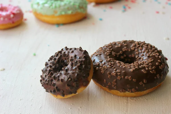 Doughnut Chocolate Icing White Textured Background Close Top View — Stock Photo, Image