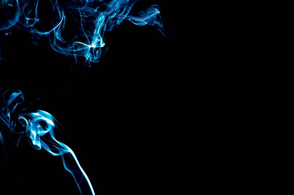 Smoke on a black background. Abstraction.