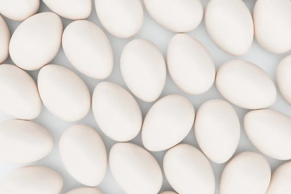 Huevos blancos. Fondo de huevos. Concepto feliz Pascua. Los huevos como símbolo de la fiesta. Antecedentes para la producción de alimentos saludables, Pascua y huevos. Ilustración 3D — Foto de Stock