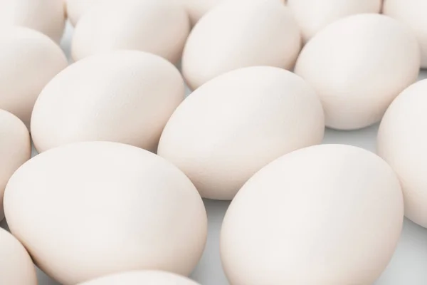 Huevos blancos. Fondo de huevos. Concepto feliz Pascua. Los huevos como símbolo de la fiesta. Antecedentes para la producción de alimentos saludables, Pascua y huevos. Ilustración 3D — Foto de Stock