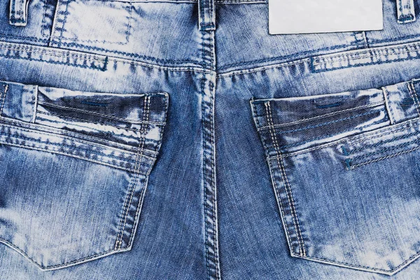 新しい青いジーンズの後部空のポケット — ストック写真