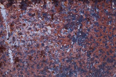 Eski paslı ve hasarlı metal yüzey yıpranmış. Arka plan