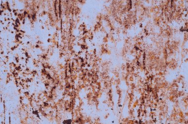 Eski paslı ve hasarlı metal yüzey yıpranmış. Arka plan