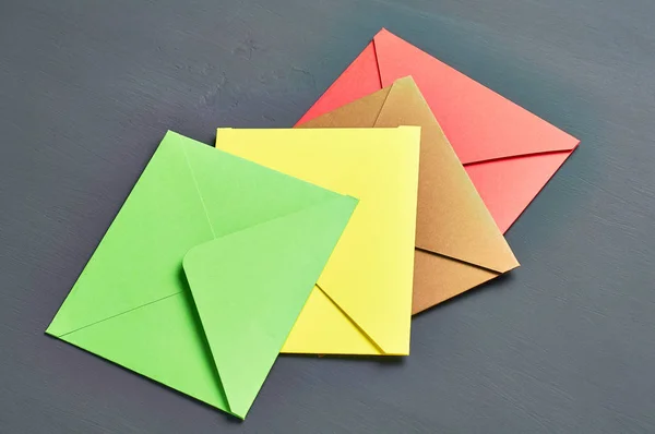 Group Colorful Square Envelopes Lies Old Scratched Dark Concrete — Stock Photo, Image