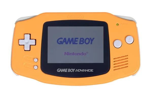 Un primer plano de un sistema de videojuegos Nintendo Gameboy Advance naranja — Foto de Stock