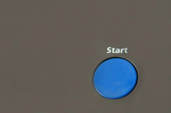 a blue start button on the grey background