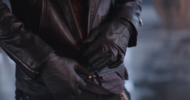 Man Zipping Leather Jacket Industrial Background Slow Motion — Stock Video