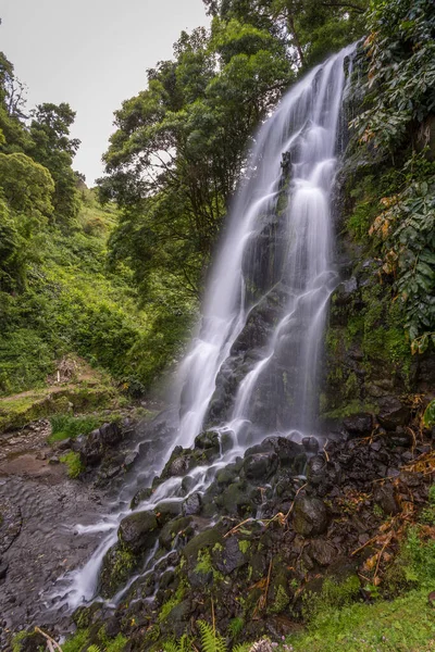 Beautiful waterfall in the interior of the Sao Miguel Island in the Azores