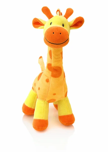 Zürafa plushie bebek gölge yansıması ile beyaz arka plan üzerinde izole. Zürafa peluş oyuncak kukla beyaz zemin üzerinde. Renkli dolma zürafa oyuncak. Sarı zürafa.