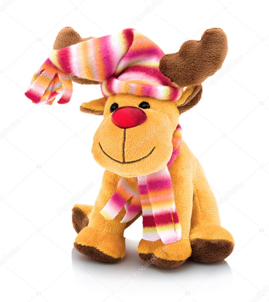 The Red Nosed Reindeer. The Red-Nosed Reindeer doll isolated on white background with shadow reflection. Plush stuffed puppet on white backdrop. Reindeer plushie toy. Santa Claus's reindeer.
