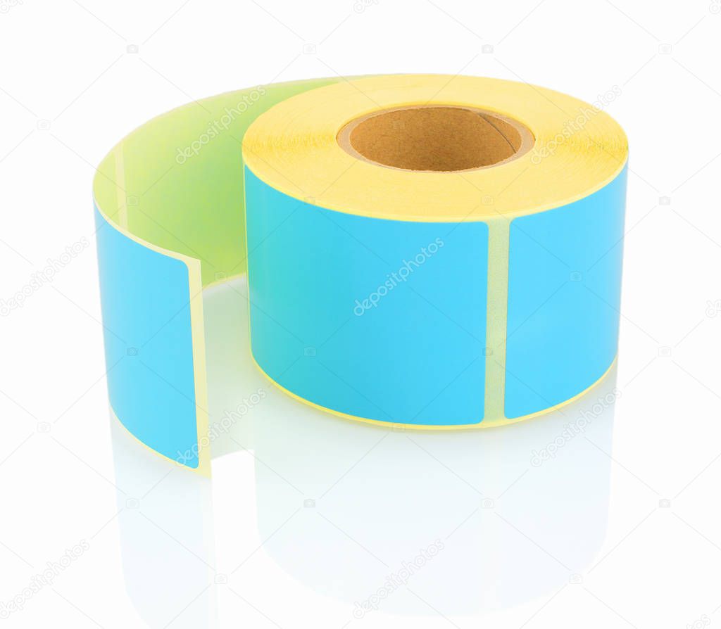 Blue label roll isolated on white background with shadow reflection. Color reel of labels for printers. Labels for direct thermal or thermal transfer printing. Blue stickers.