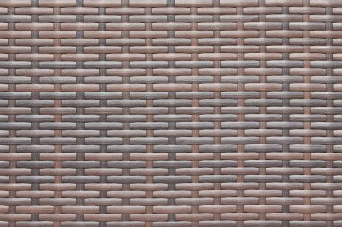 Rattan doku arka plan. Kahverengi rattan duvar kağıdı. Plastik rattan yakın çekim.