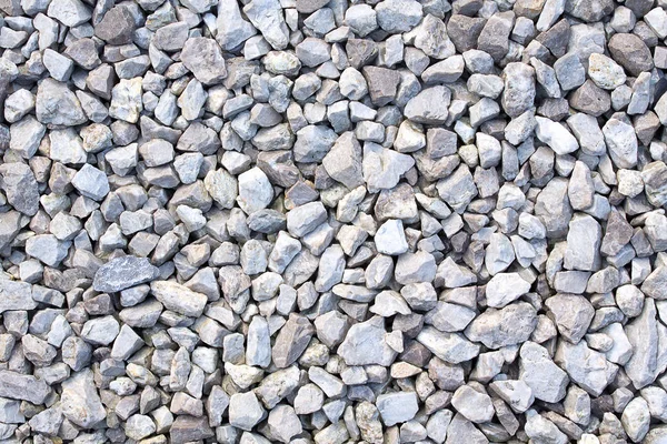 Doku çakıl. Küçük taşlar, küçük kayalar, çakıl taşları birçok tonları gri, beyaz ve mavi. Küçük taş dokusuna