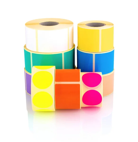 Colored label rolls isolated on white background with shadow reflection. Color reels of labels for printers. Labels for direct thermal or thermal transfer printing. Square and circle labels background