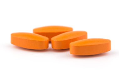 Beyaz bir arka plan üzerinde sağlıklı vitamin.