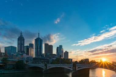 Picturesque Melbourne cityscape at sunrise clipart