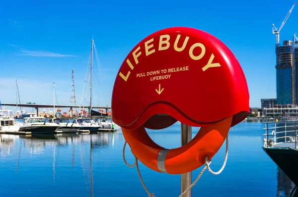 Bright red life buoy — Stock Photo, Image