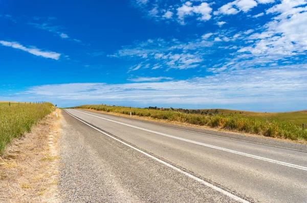 Asphalt road on sunny day — Stock Photo, Image