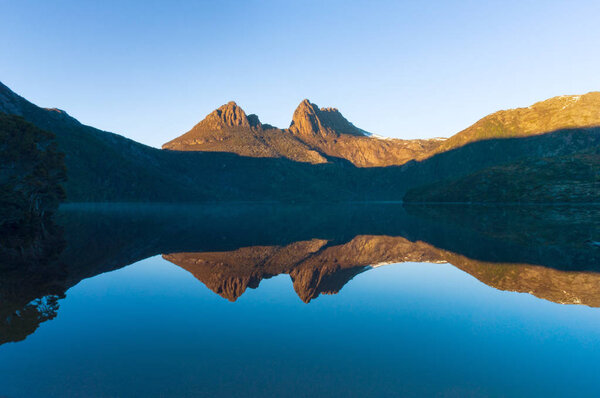 Beautiful mountain reflected in lake in the morning